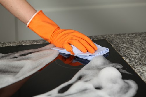Professional office cleaners working in an Enfield workplace