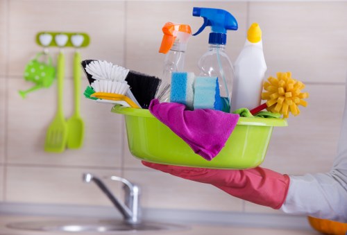 Professional oven cleaner in Enfield deep cleaning a kitchen oven